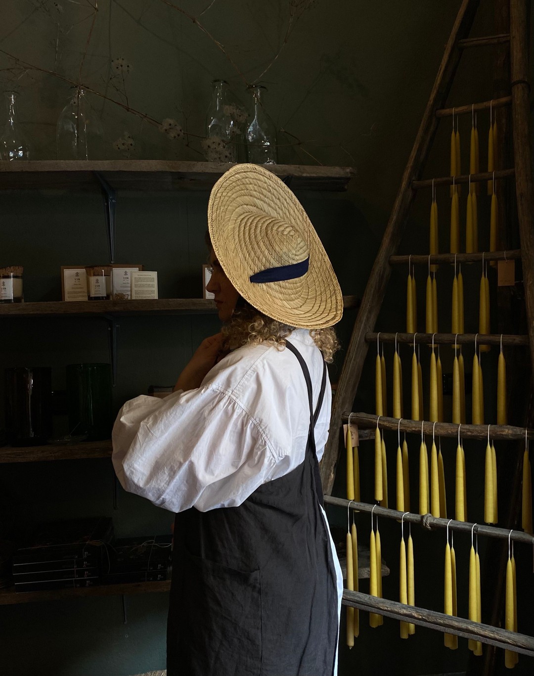 Vicolo Via Mameli, Milan. Straw bonnet